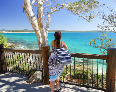 Lady on a Noosa Beach lookout.