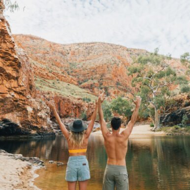 Happy couple at an outback water hole.