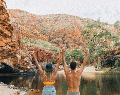 Happy couple at an outback water hole.
